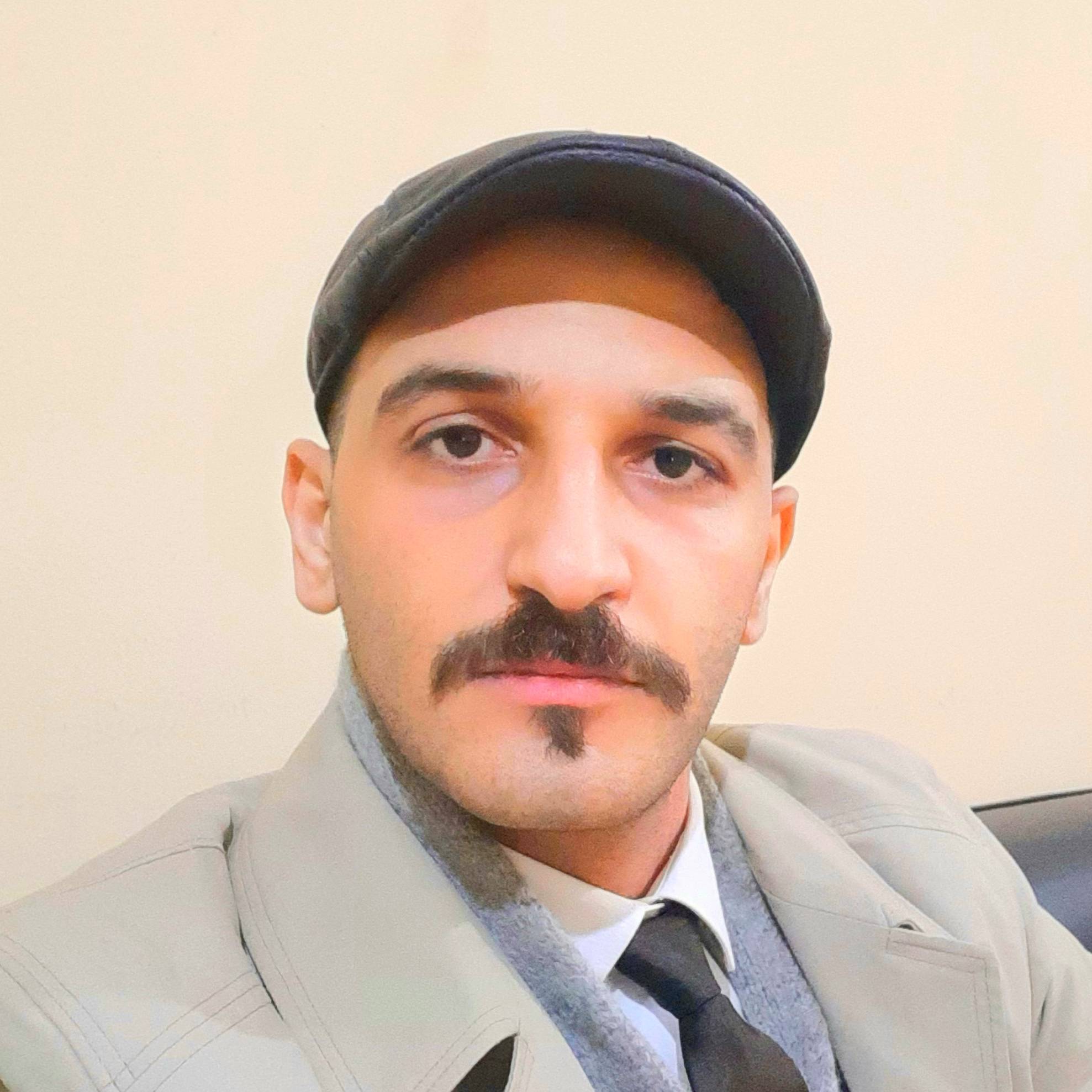 AMJAD ALATIKEE